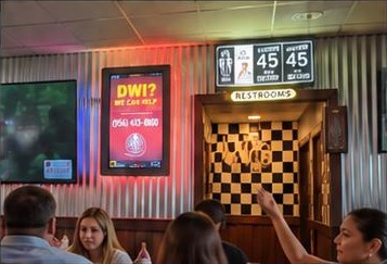 Local business ad playing on a URTVS screen