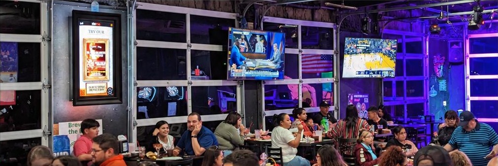 URTVS screen inside a busy South Texas venue